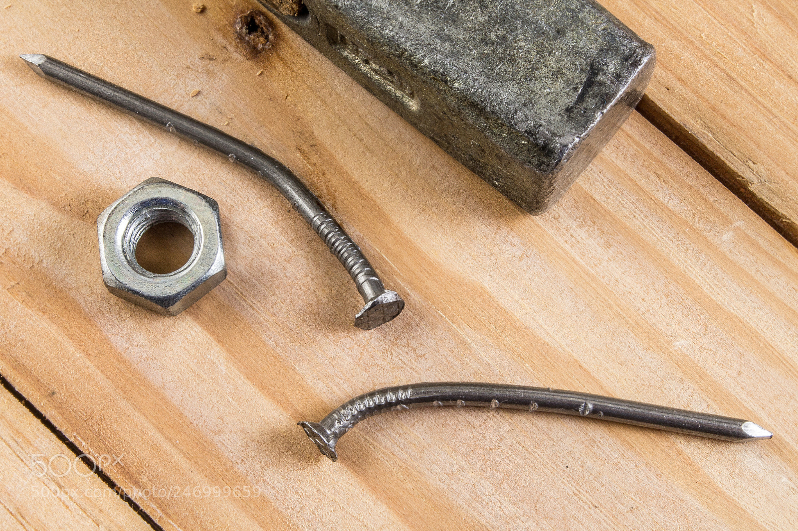 Canon EOS 1100D (EOS Rebel T3 / EOS Kiss X50) sample photo. Nut, two nails and photography