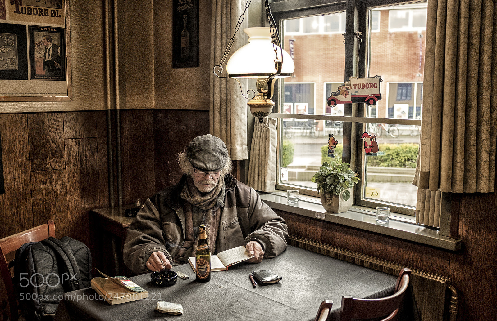 Fujifilm X100S sample photo. Reading in the pub photography