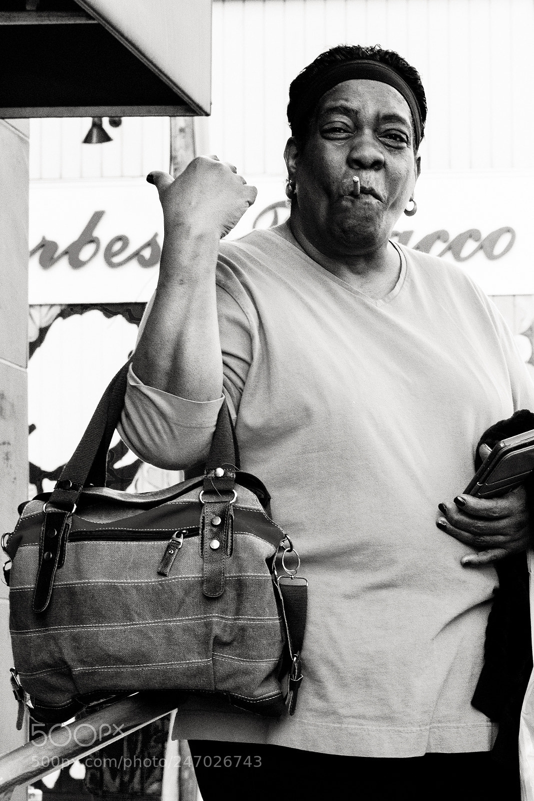 Sony a6500 sample photo. Woman holding cigarette in photography