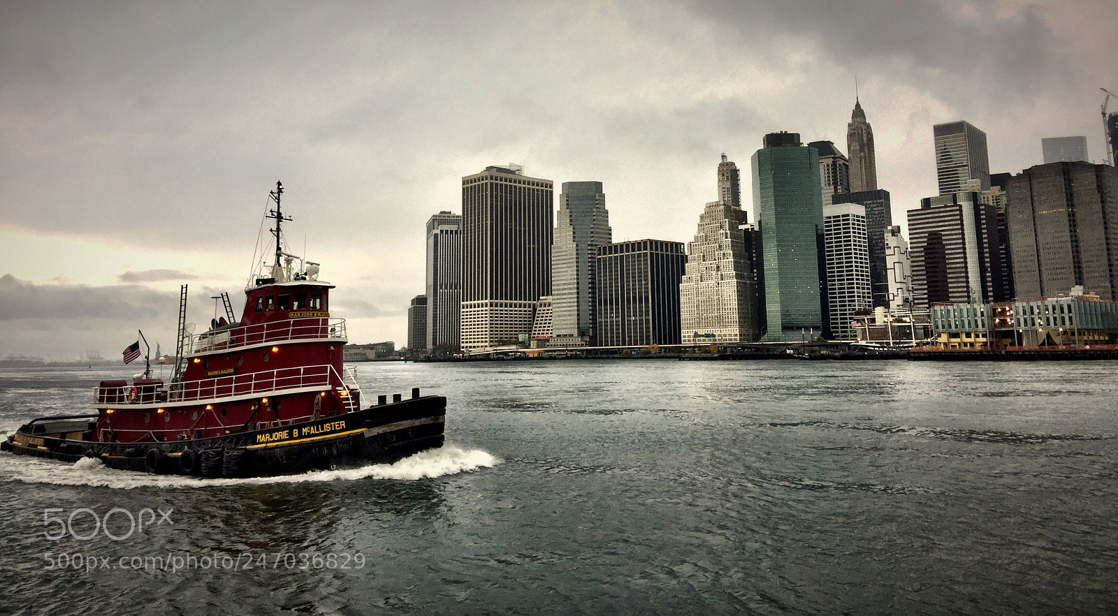 Apple iPhone 6 Plus sample photo. A tugboat in front photography