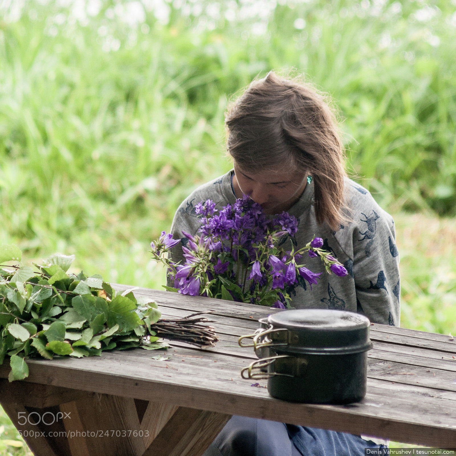 Canon EOS 40D sample photo. Young girl sniffing flowers photography