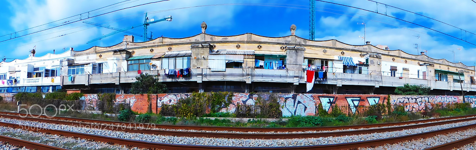 Panasonic Lumix DMC-FZ200 sample photo. Les cases del carrer photography
