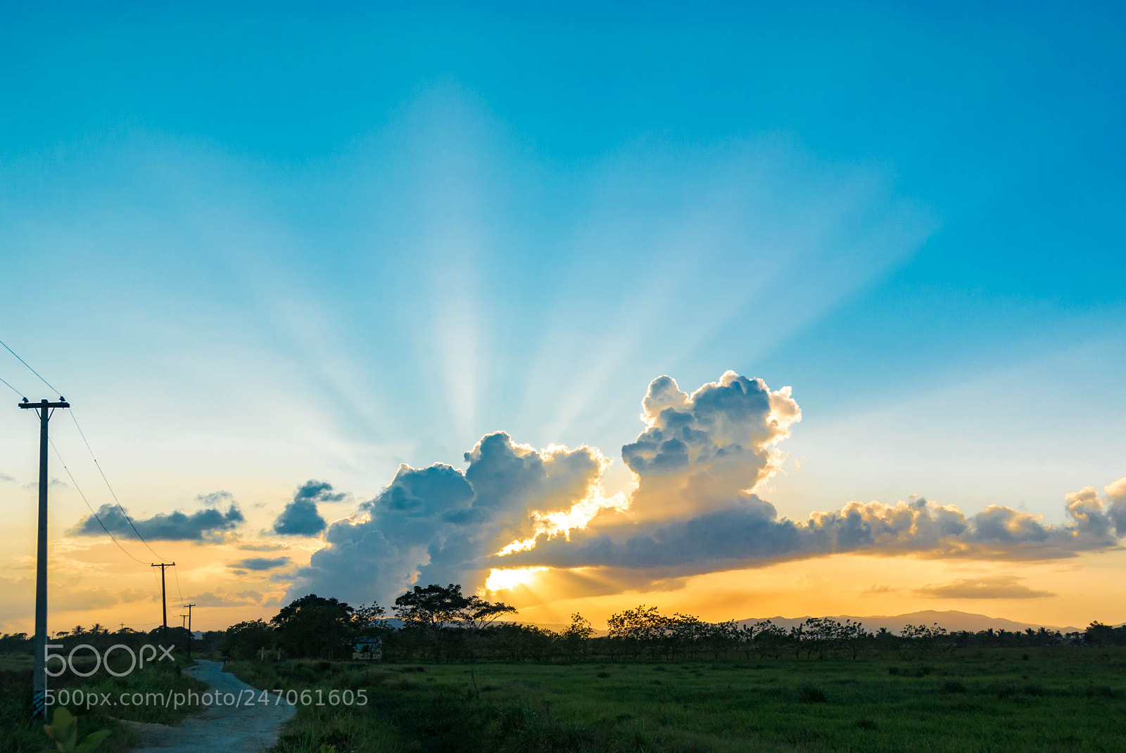 Nikon 1 J1 sample photo. Puesta de sol cruce photography