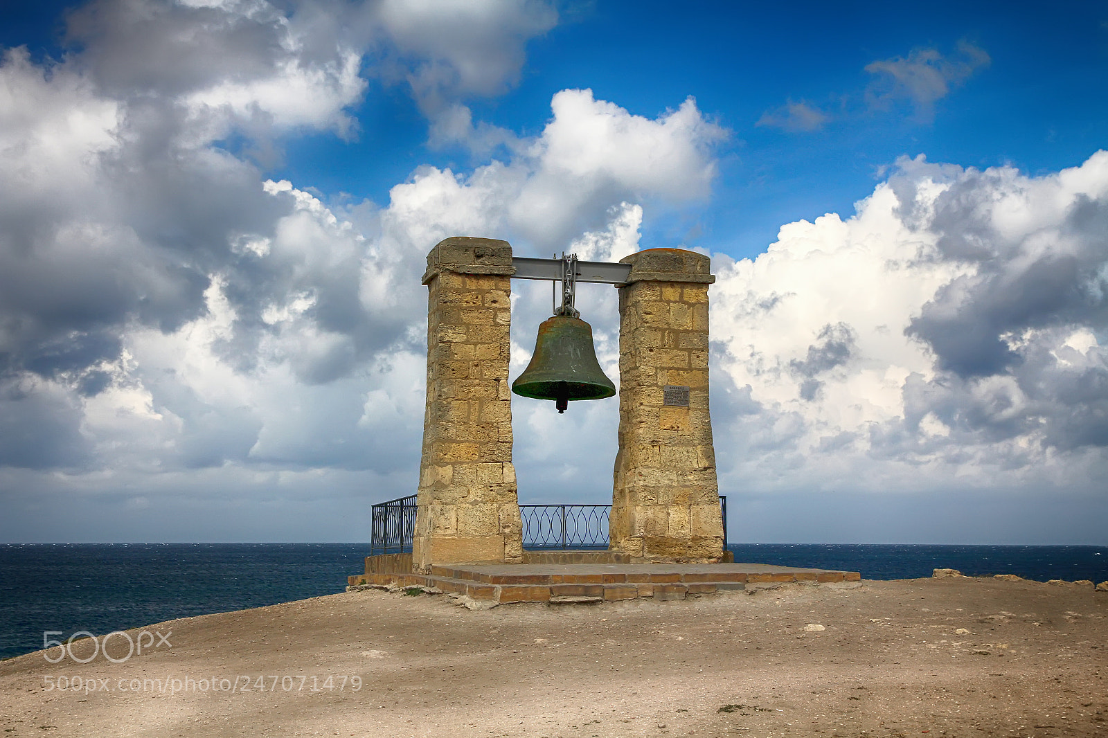 Canon EOS 60D sample photo. Seascape with a bell photography