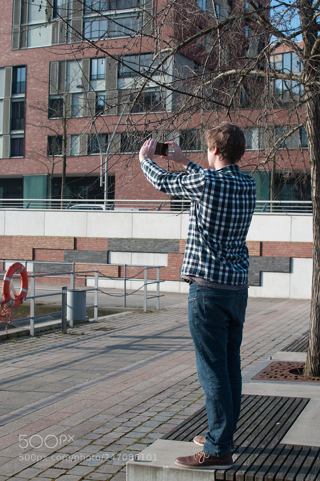Nikon D300S sample photo. Young caucasian man taking photography