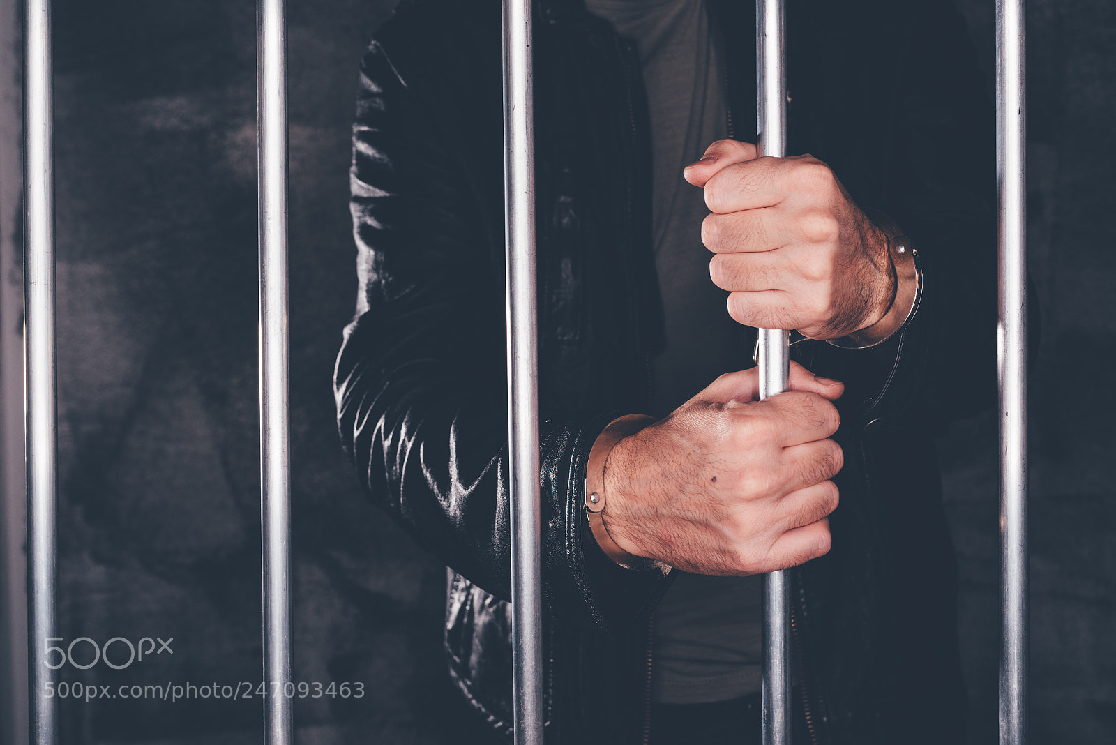 Nikon D600 sample photo. Handcuffed man behind prison photography