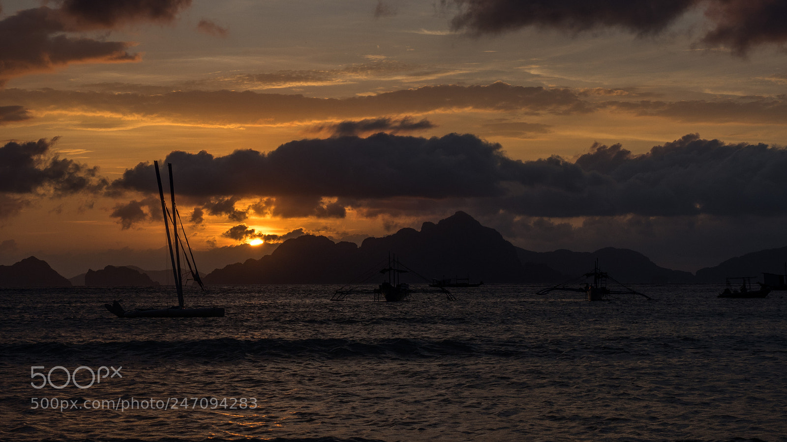 Olympus OM-D E-M5 II sample photo. Boating under the sunset photography