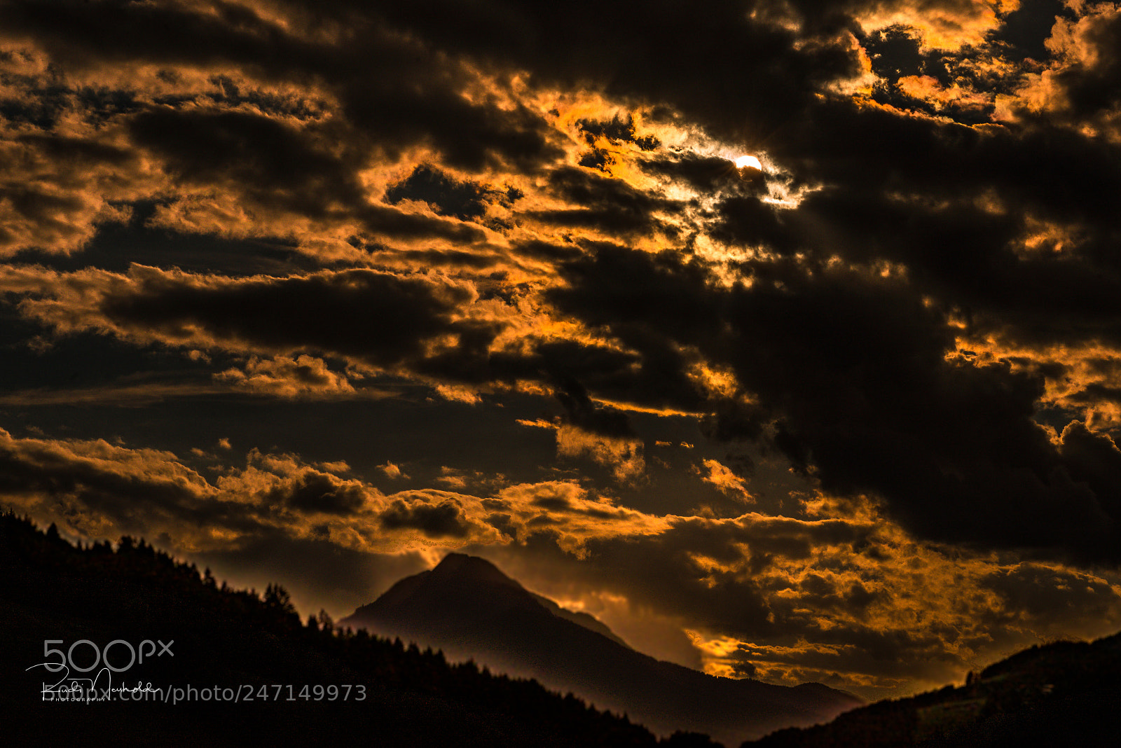 Nikon D600 sample photo. Sunset through the clouds photography
