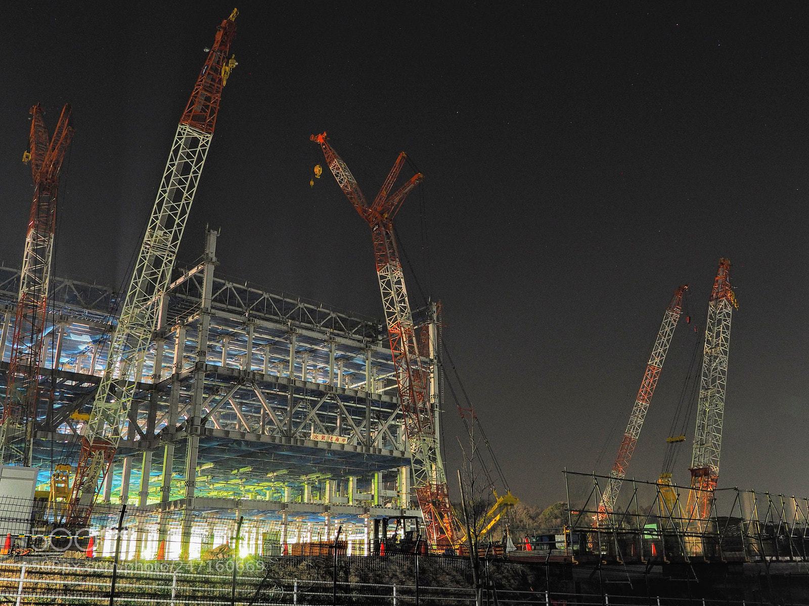 Olympus OM-D E-M10 II sample photo. A huge factory under photography