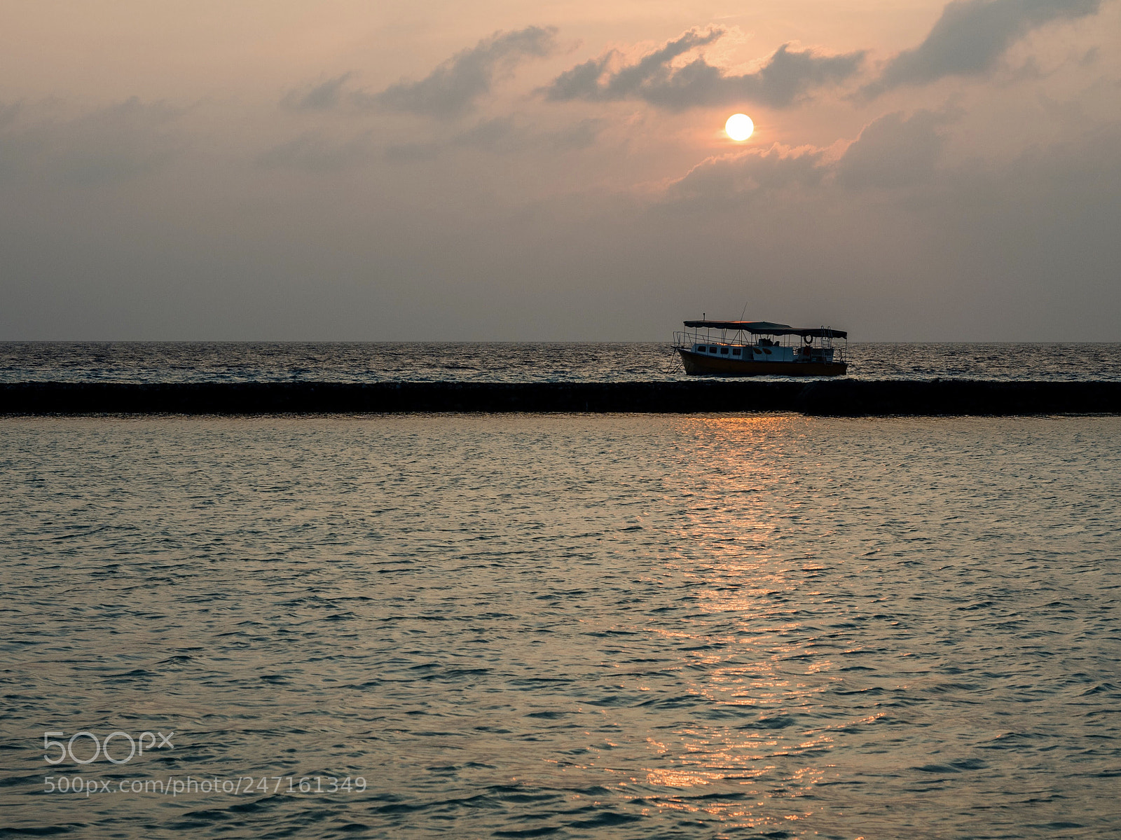 Olympus PEN E-PL7 sample photo. Sunrise and a boat photography