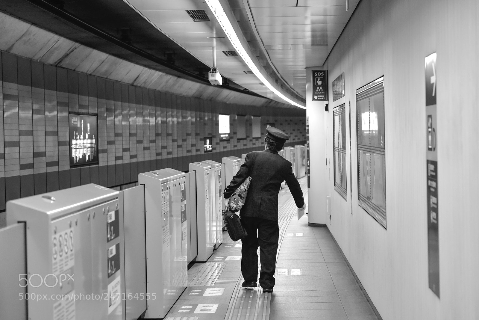 Nikon D810 sample photo. A train conductor heads photography