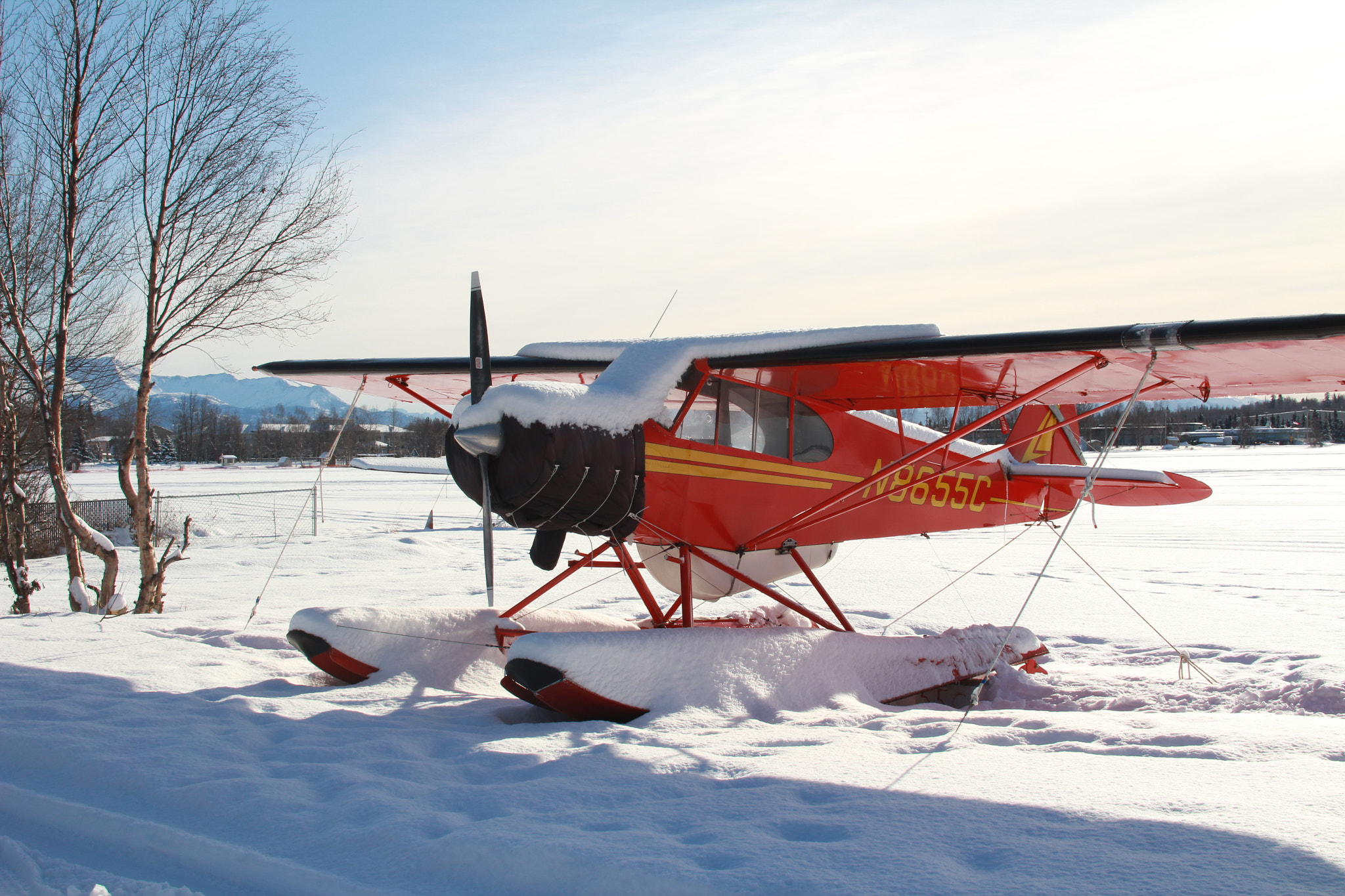 Canon EOS 1300D (EOS Rebel T6 / EOS Kiss X80) + Sigma 30mm F1.4 EX DC HSM sample photo. Bush plane in storage photography