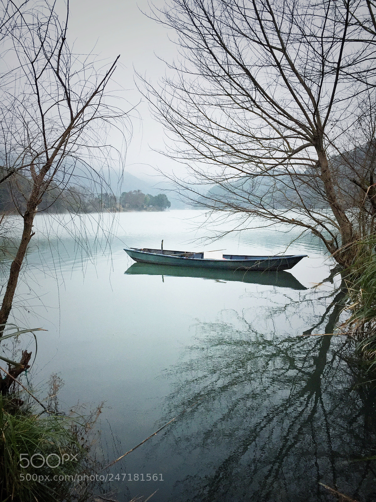 Apple iPhone 6 Plus sample photo. A lonely boat photography