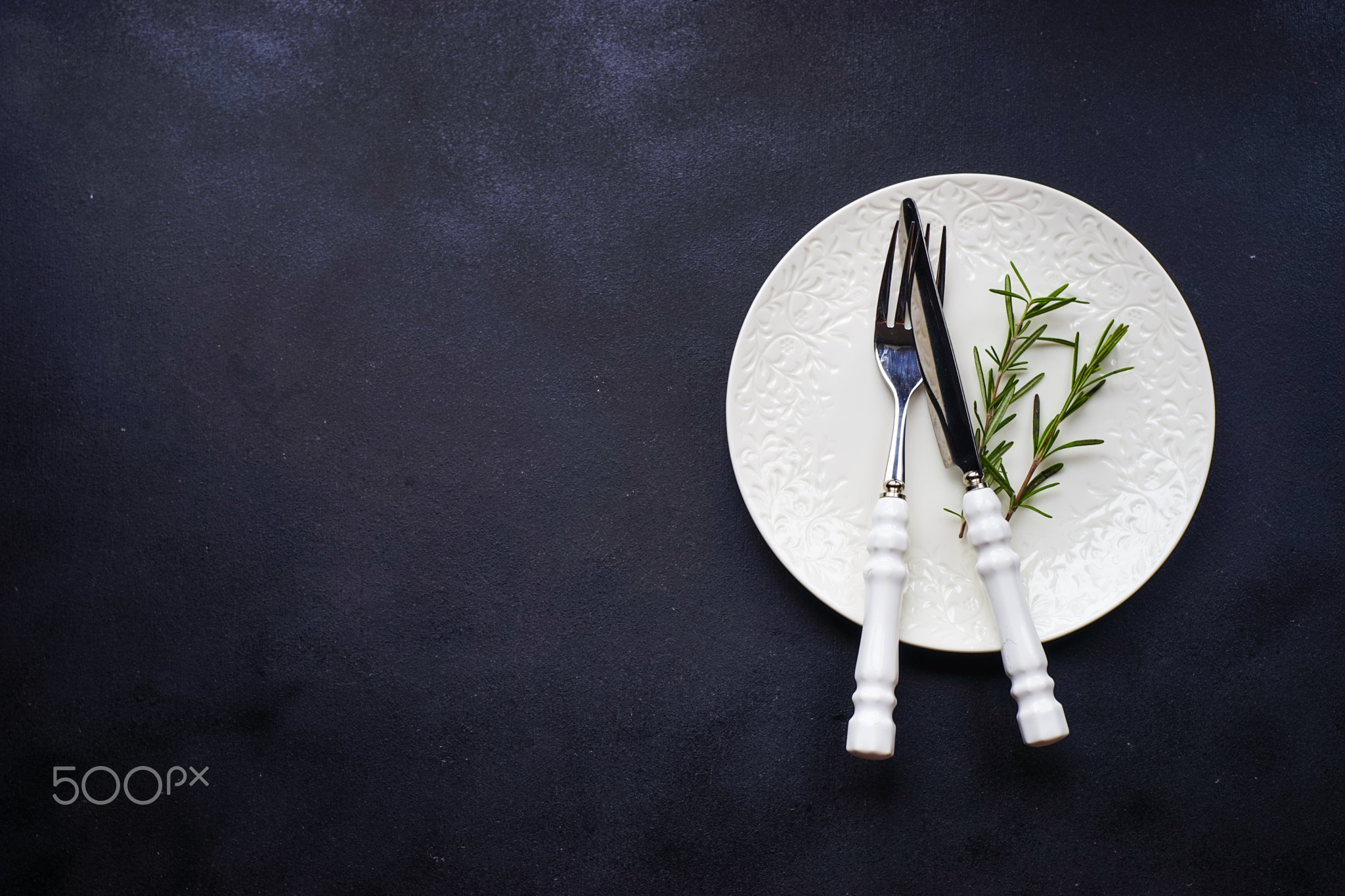 Table setting with rosemary