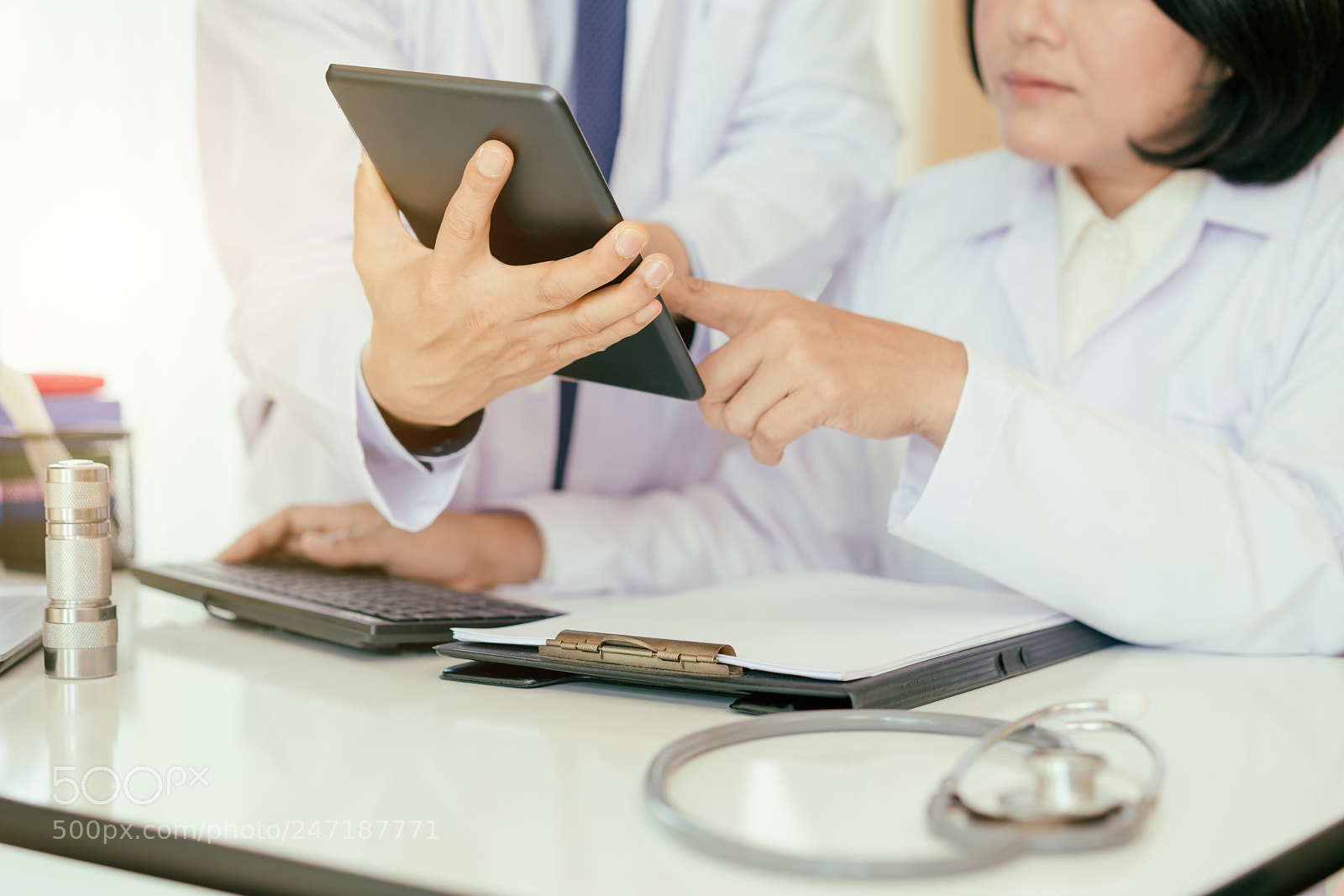 Sony a7R II sample photo. Two doctors analysing and photography