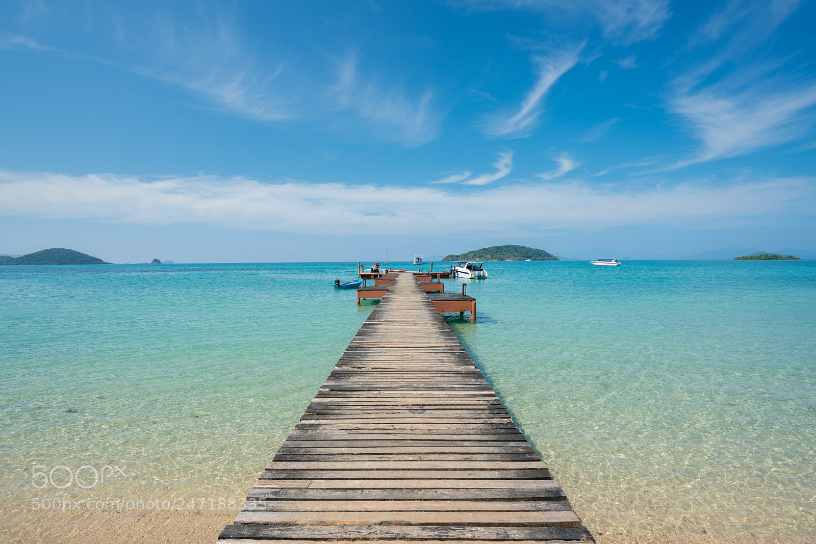 Sony a7R II sample photo. Wooden pier with boat photography