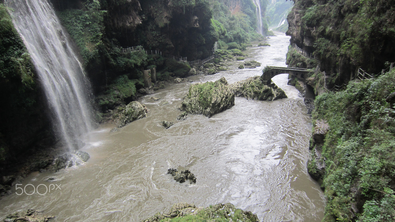 Canon PowerShot ELPH 300 HS (IXUS 220 HS / IXY 410F) sample photo. A canyon river, waterfall, broken bridge photography