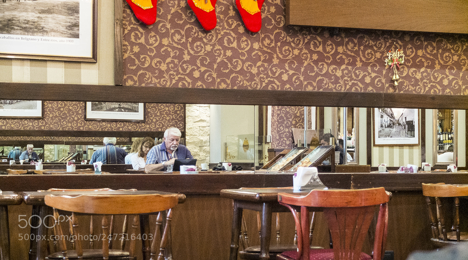 Fujifilm X10 sample photo. Reflections in the café photography