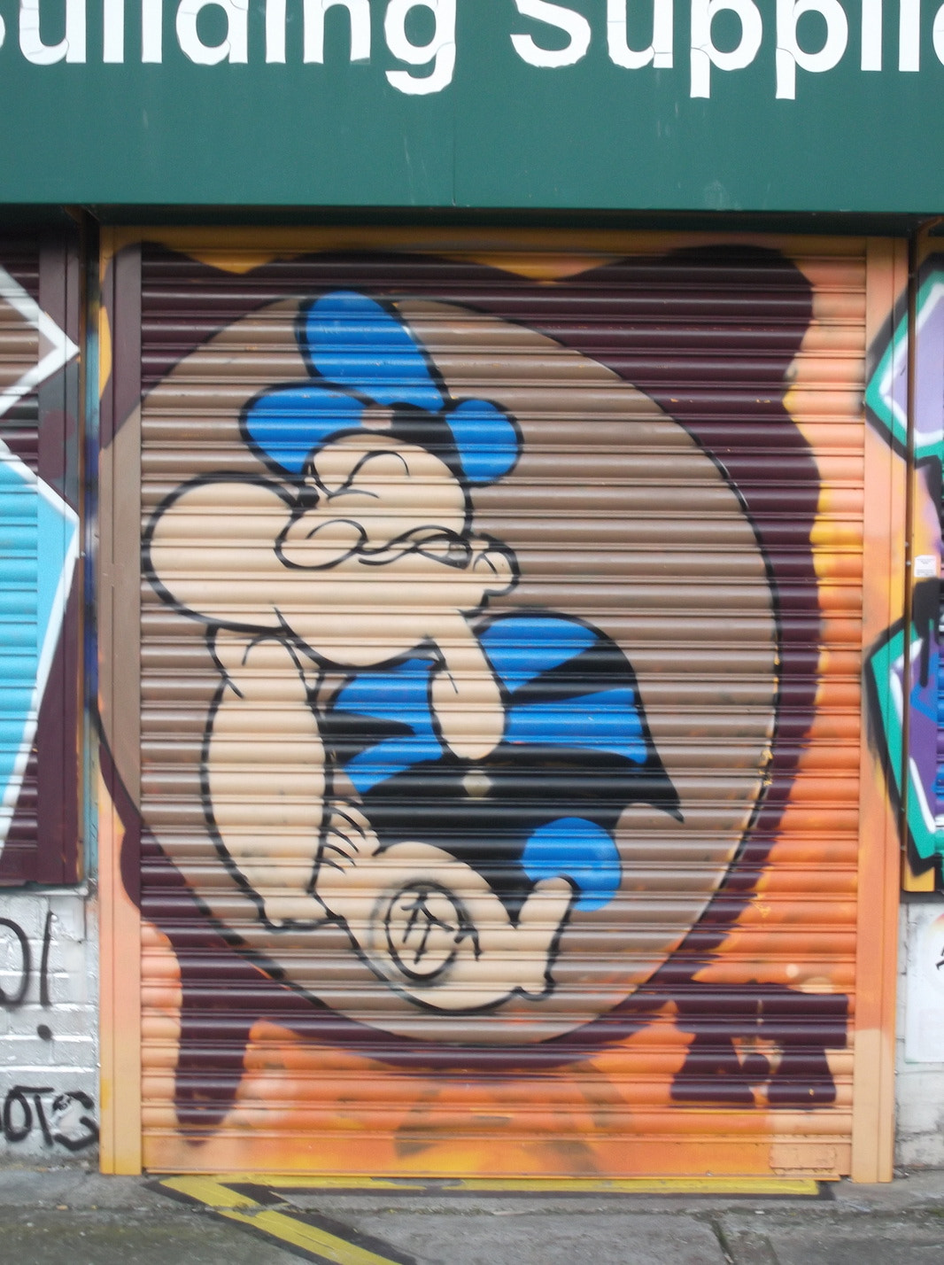 Fujifilm FinePix JV250 sample photo. Popeye ponders graffiti (trafalgar lane brighton) photography