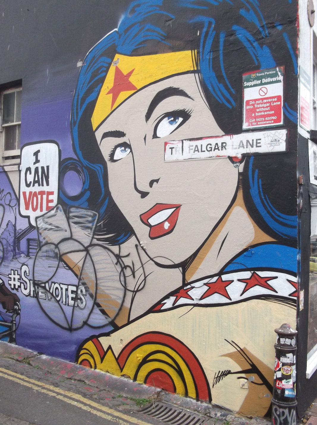 Fujifilm FinePix JV250 sample photo. Wonder woman rocks the vote graffiti (trafalgar lane brighton) photography