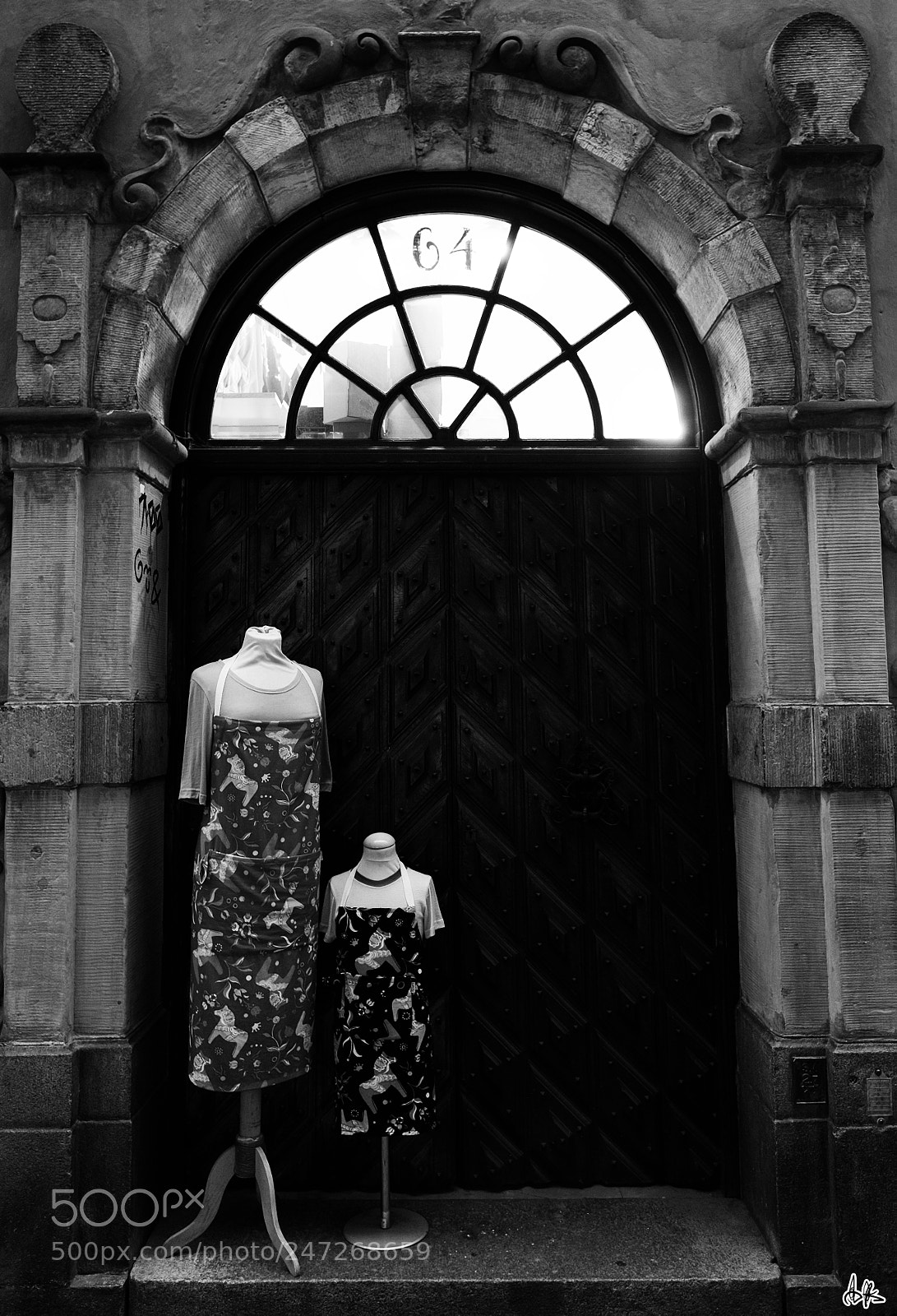 Fujifilm X-T1 sample photo. Aprons in doorway. photography