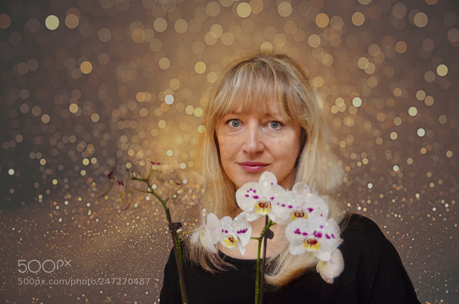 Nikon D5100 sample photo. Woman and orchid photography
