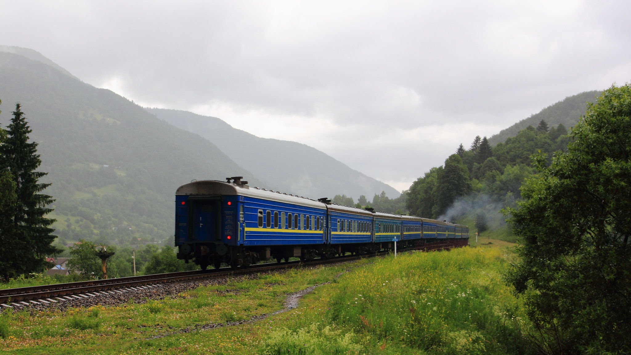 Canon EOS 60D + Canon EF 17-40mm F4L USM sample photo. Train in mountains photography