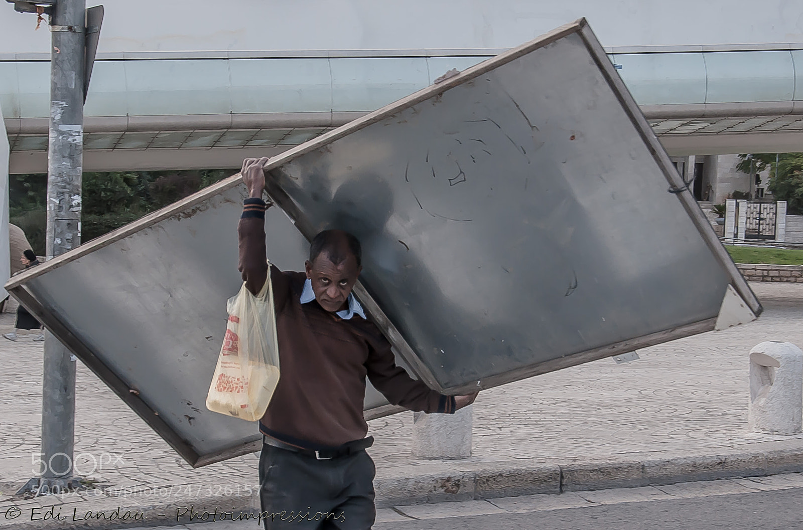 Nikon D5000 sample photo. A burden upon his photography