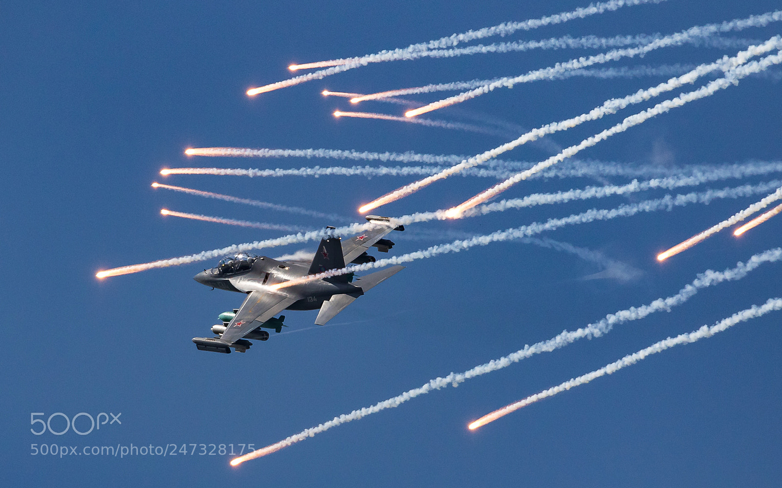Canon EOS 7D Mark II sample photo. Yak-130 and flares rain photography