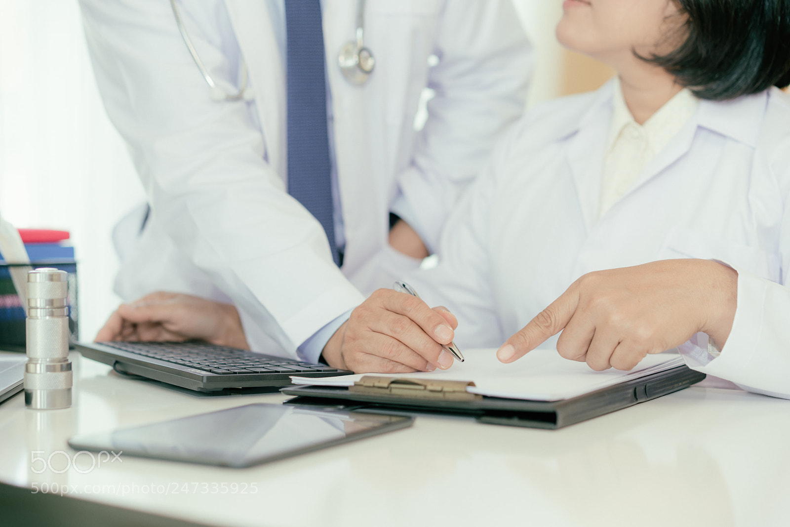 Sony a7R II sample photo. Two doctors analysing and photography