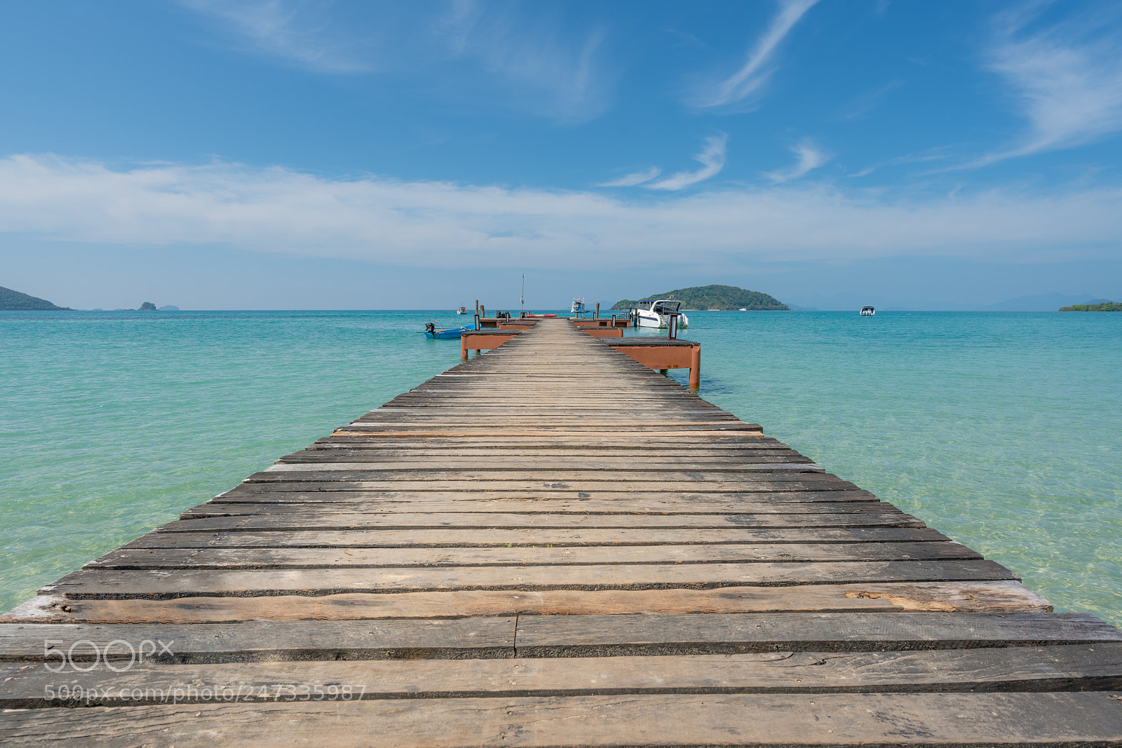 Sony a7R II sample photo. Wooden pier with boat photography