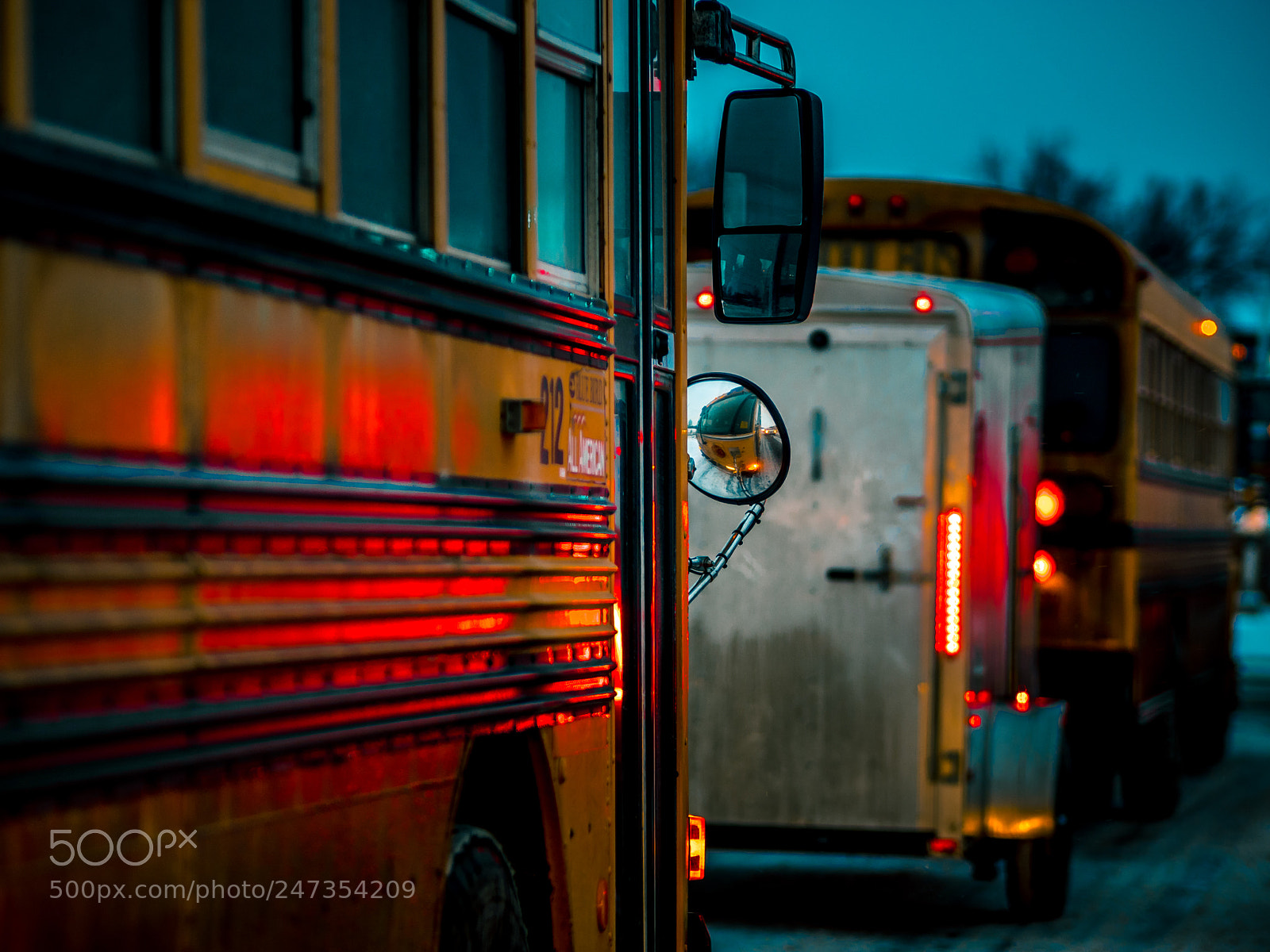 Olympus OM-D E-M1 sample photo. School buses lined up photography