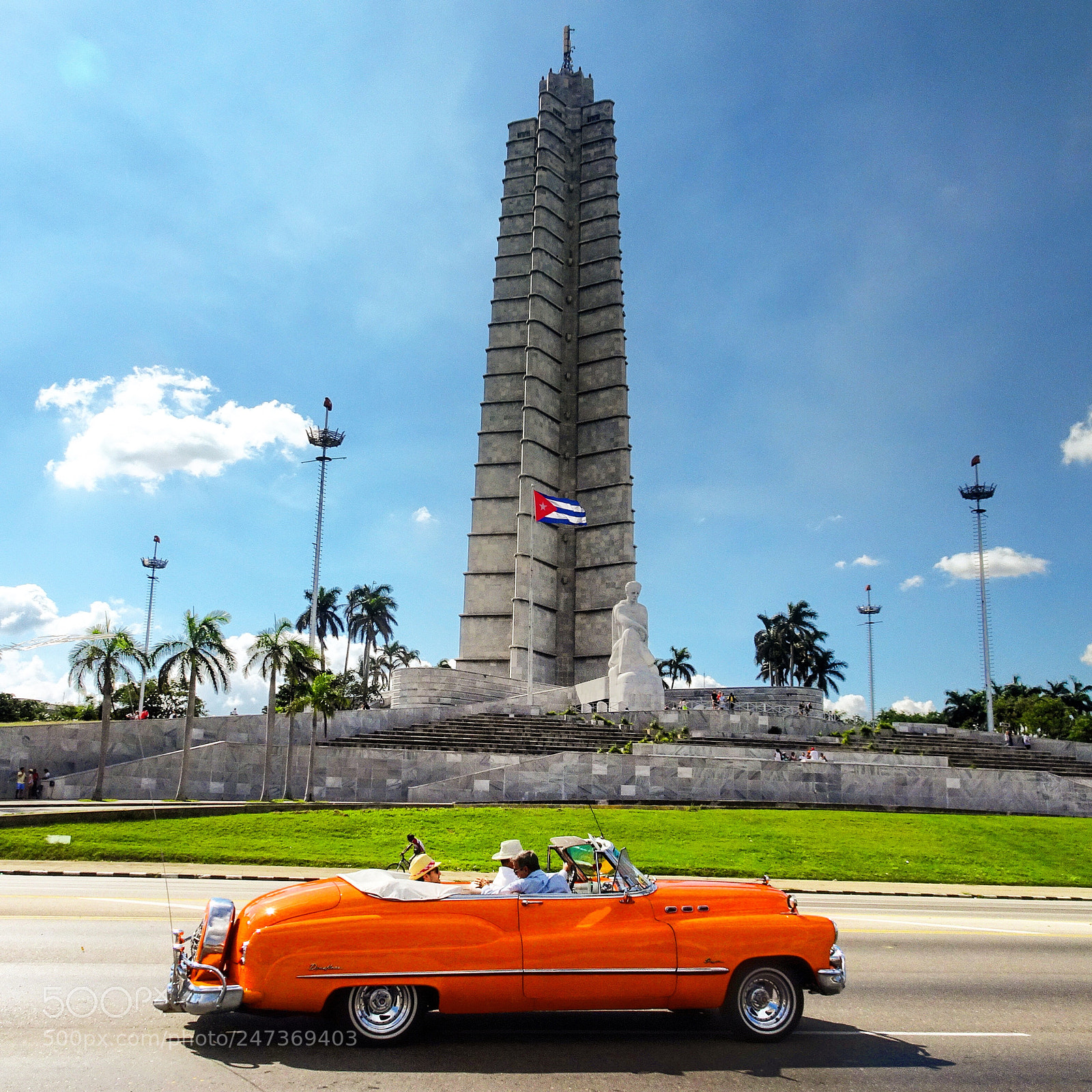 Sony DSC-HX90 sample photo. Monument and orange car photography