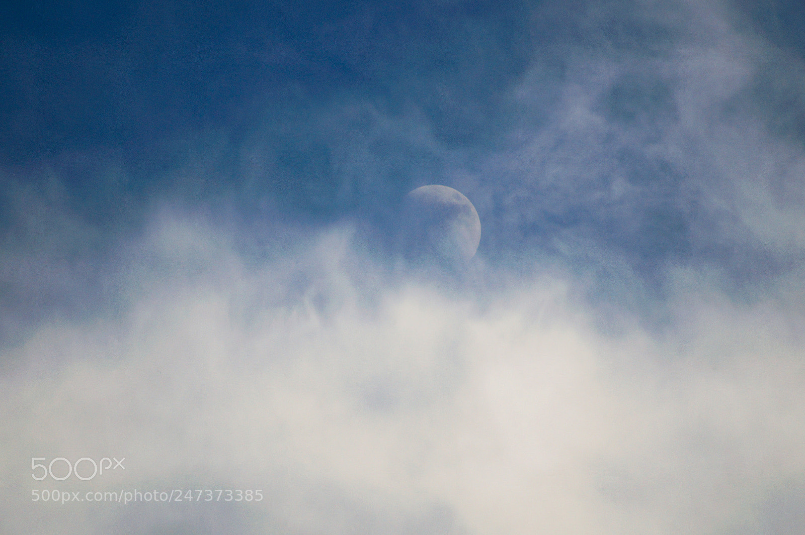 Sony SLT-A58 sample photo. Moon rising through clouds photography