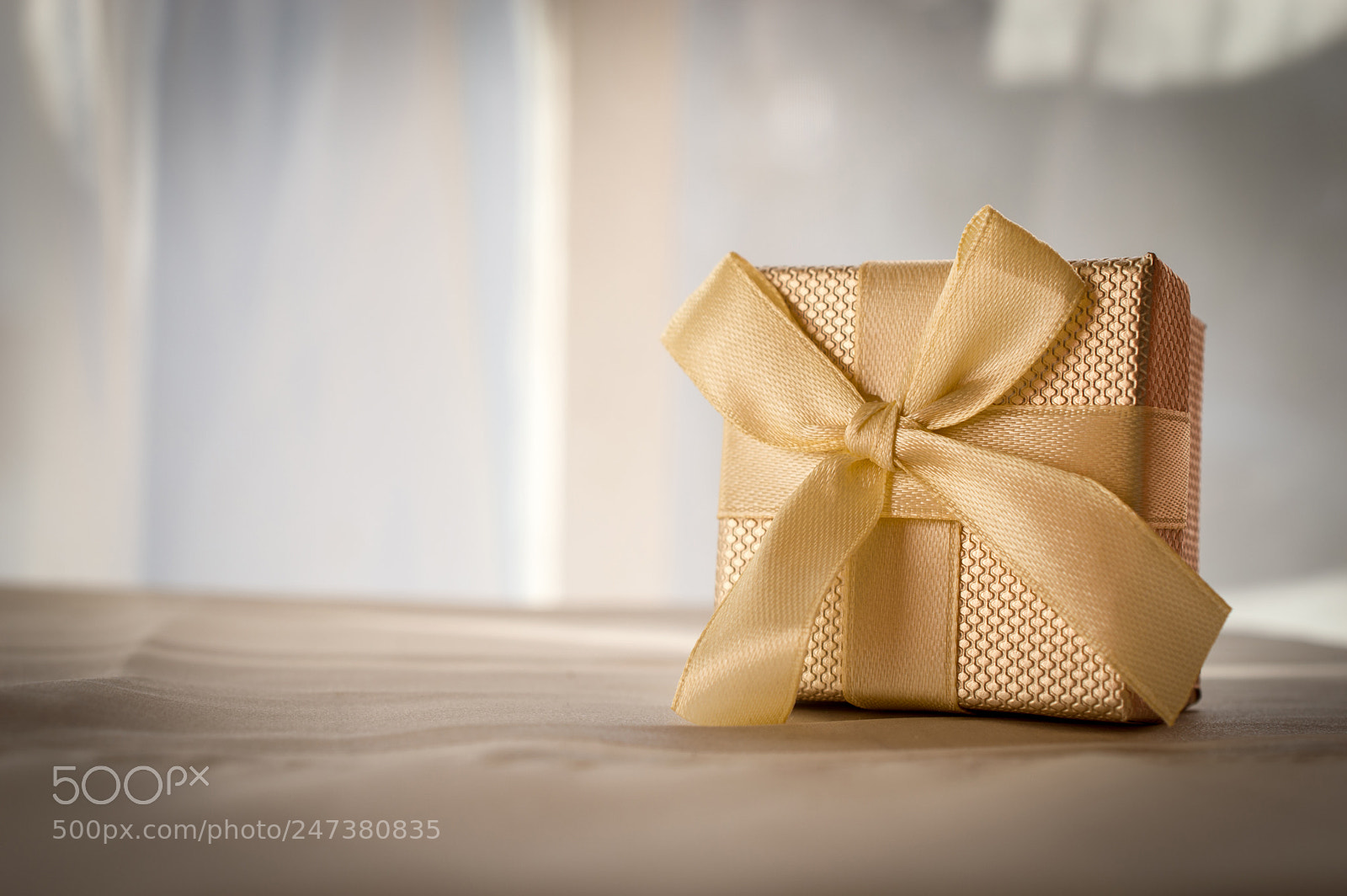 Nikon D3200 sample photo. Golden gift box photography
