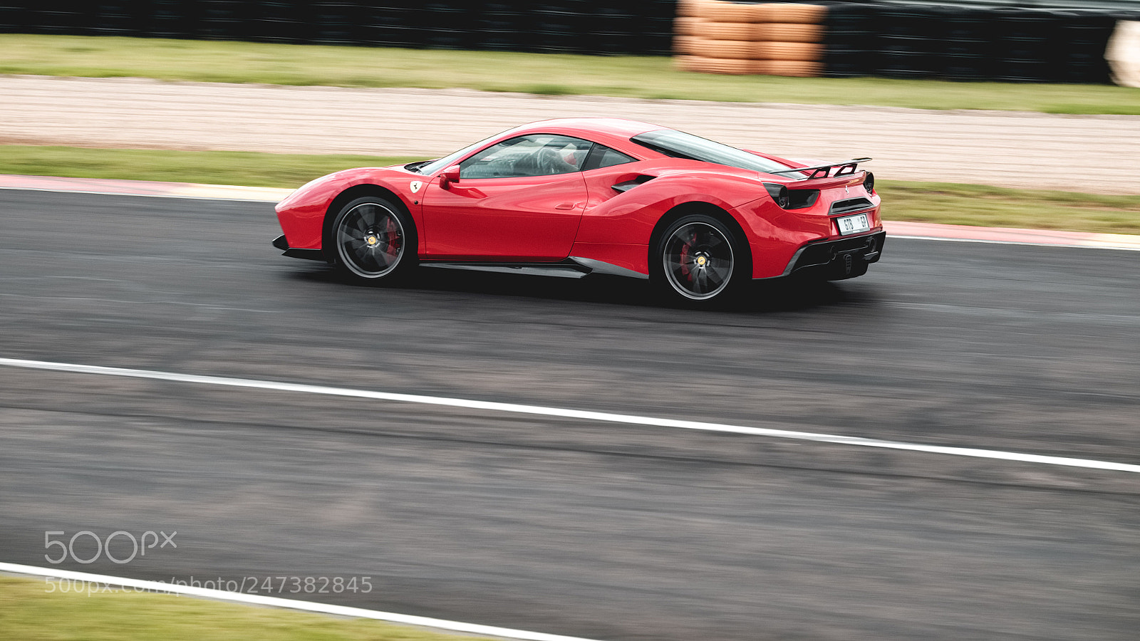 Fujifilm X-T1 sample photo. Ferrari on track photography