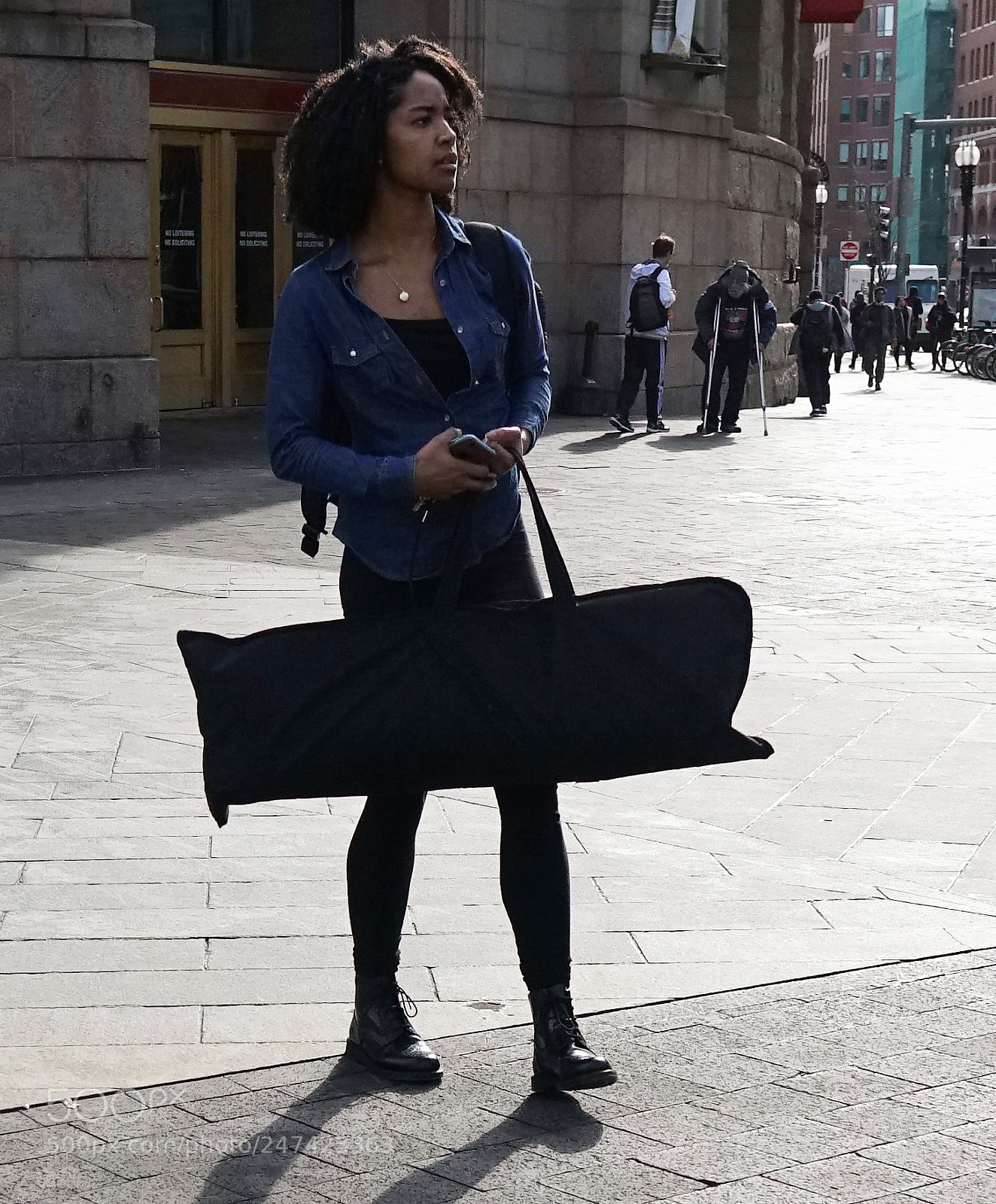 Sony a6500 sample photo. A woman waiting outside photography