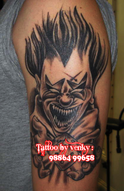 Canon PowerShot A580 sample photo. Evil clown tattoo photography