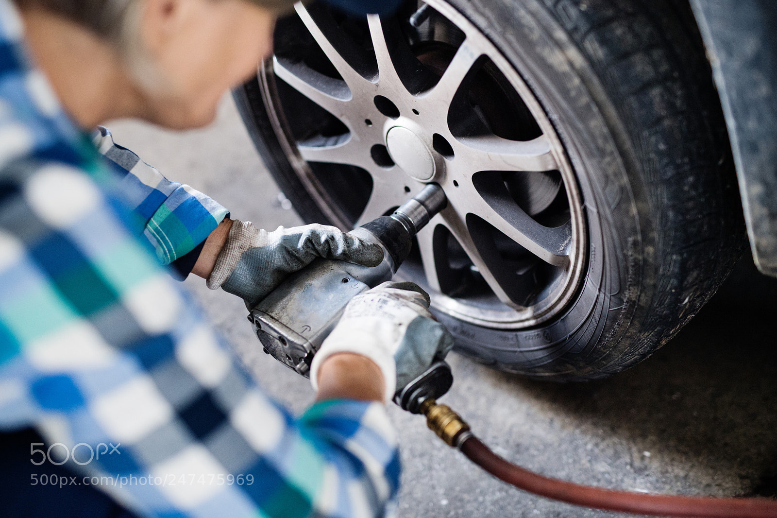 Nikon D5 sample photo. Senior female mechanic repairing photography