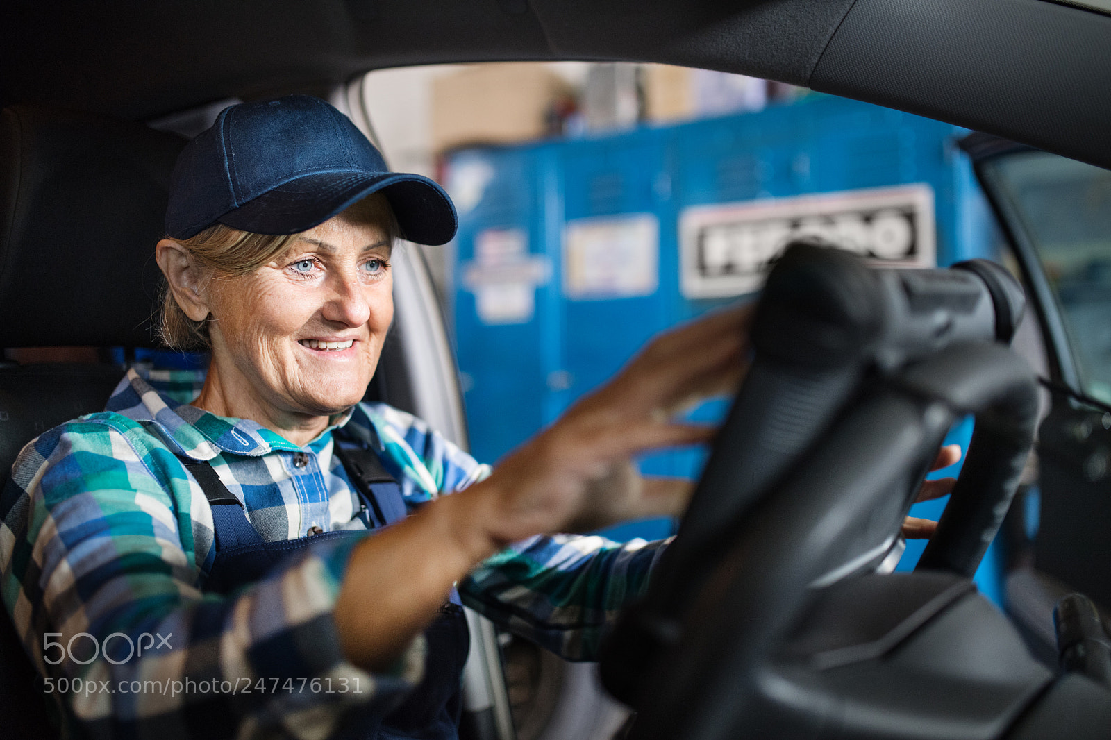 Nikon D5 sample photo. Senior female mechanic repairing photography