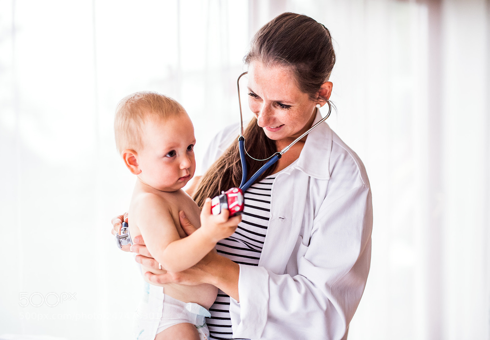 Nikon D5 sample photo. Young doctor examining a photography
