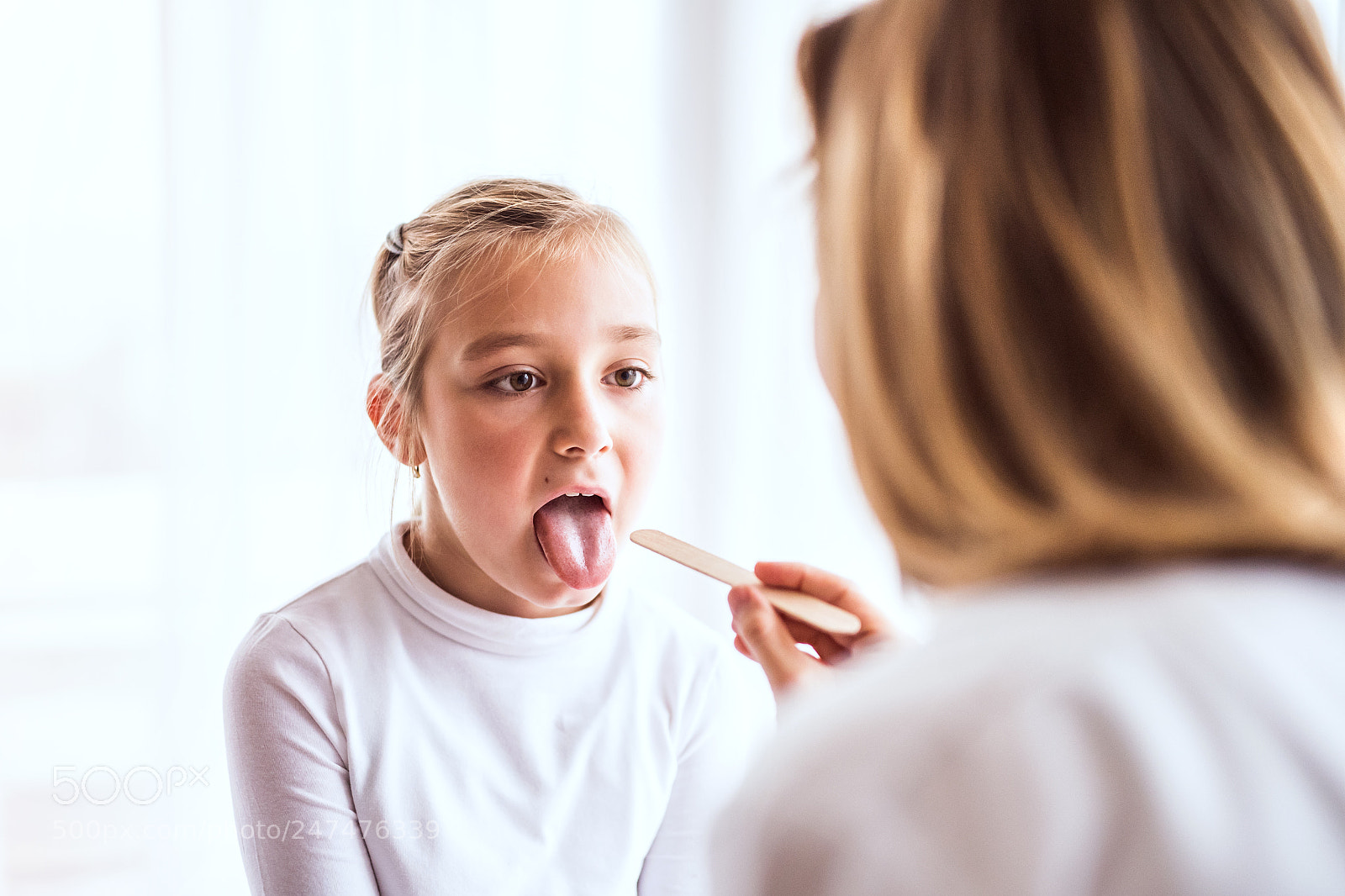 Nikon D5 sample photo. Young female doctor examining photography