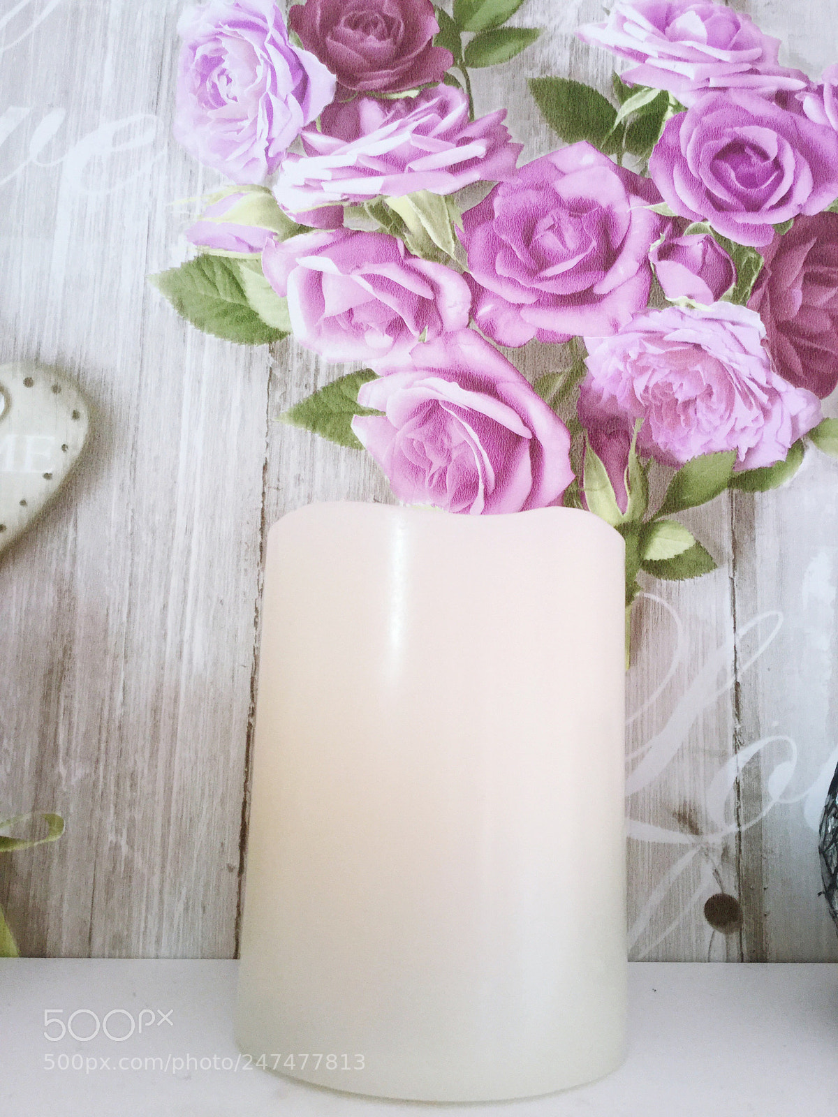 Apple iPad Air 2 sample photo. Candle against flowers photography