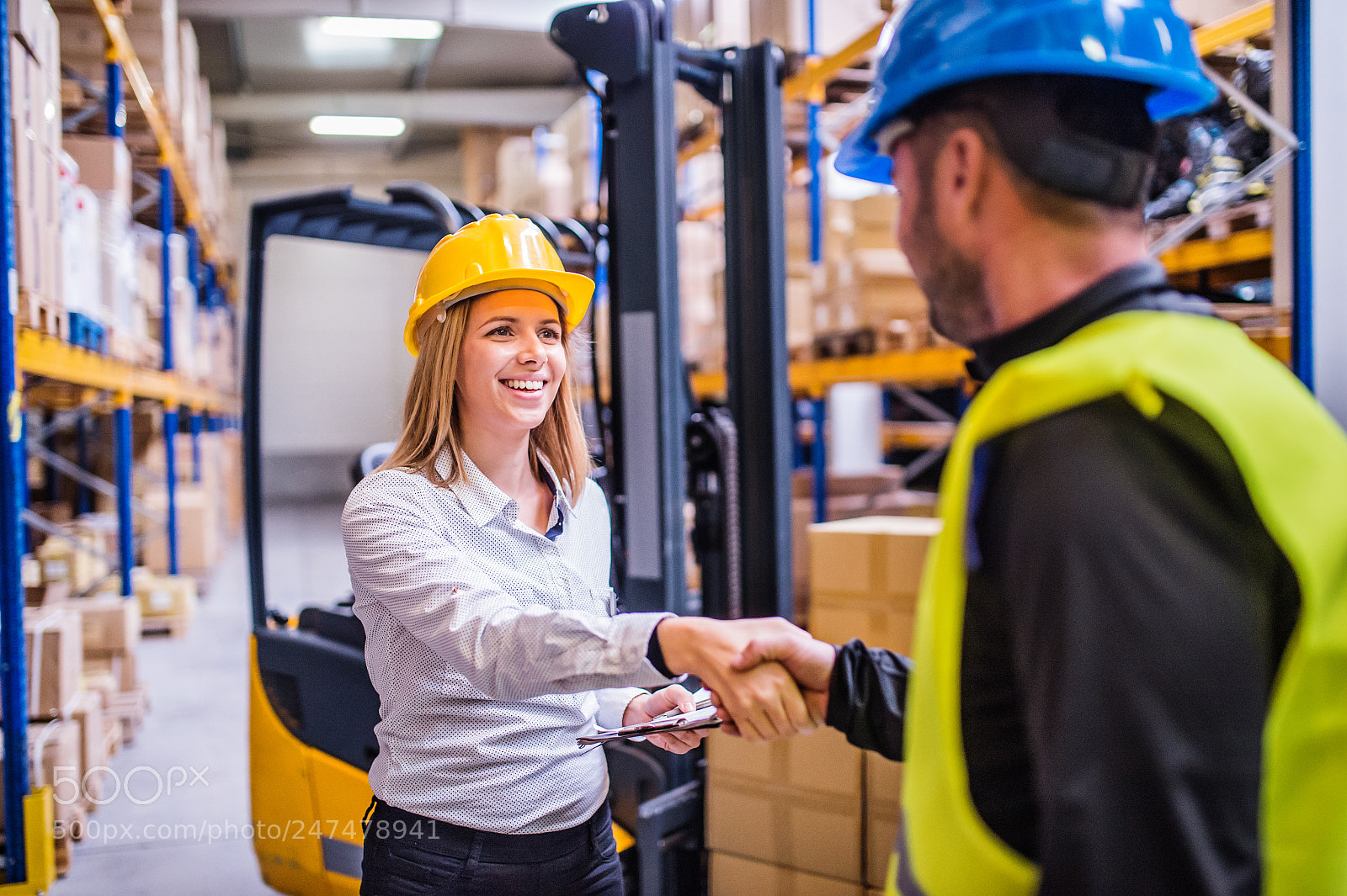 Nikon D4S sample photo. Young warehouse workers working photography