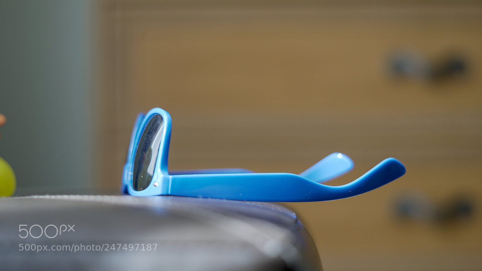 Sony a6500 sample photo. Blue sunglasses on a photography