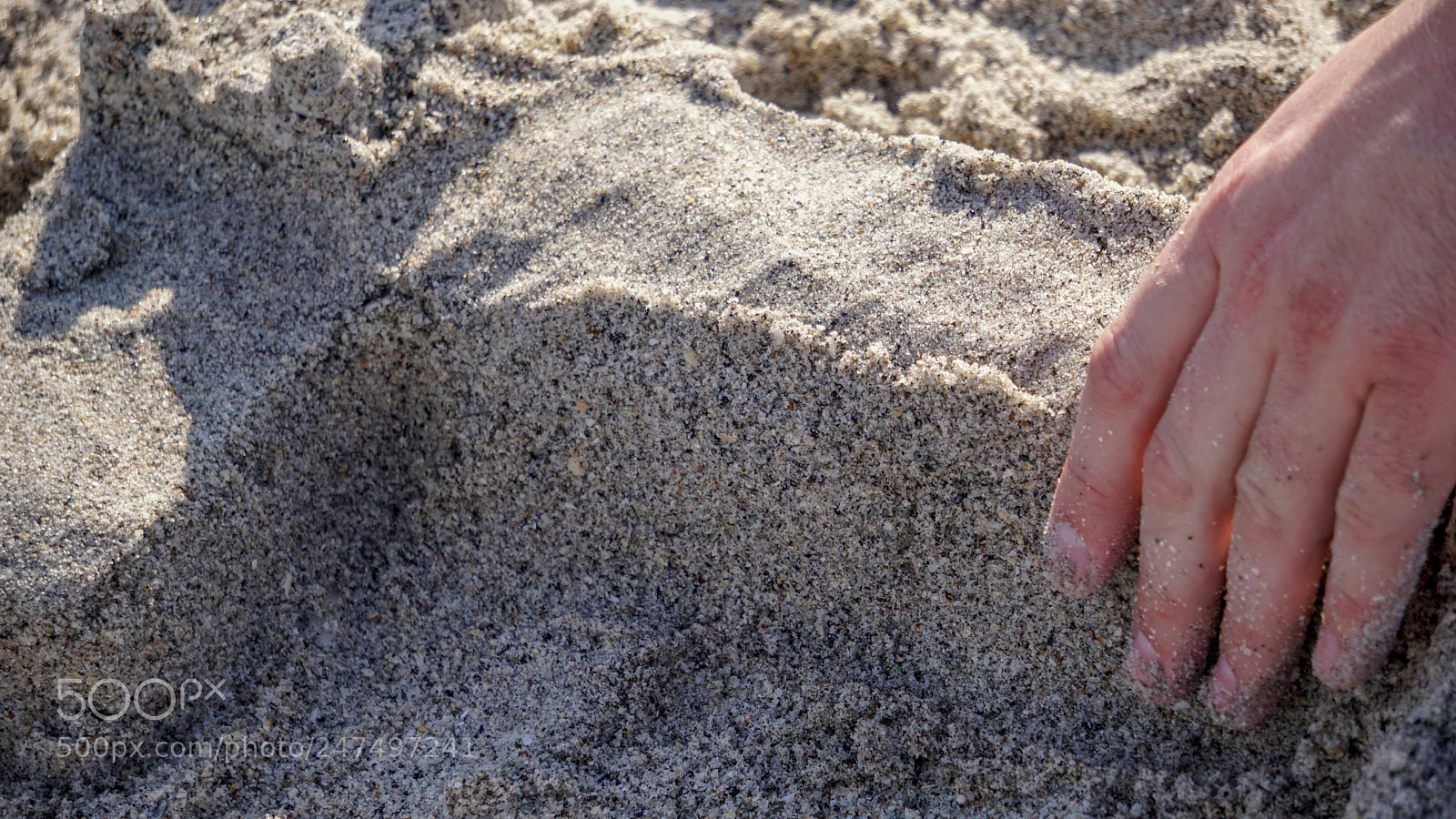 Sony a6500 sample photo. Hand building a sand photography