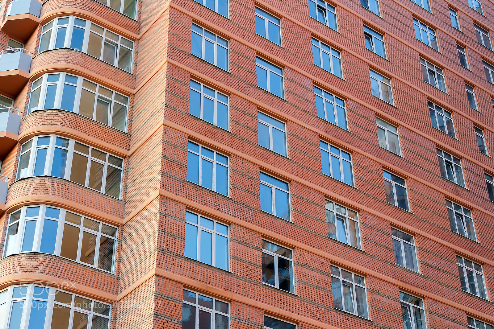 Canon EOS 550D (EOS Rebel T2i / EOS Kiss X4) sample photo. Brick high-rise building photography