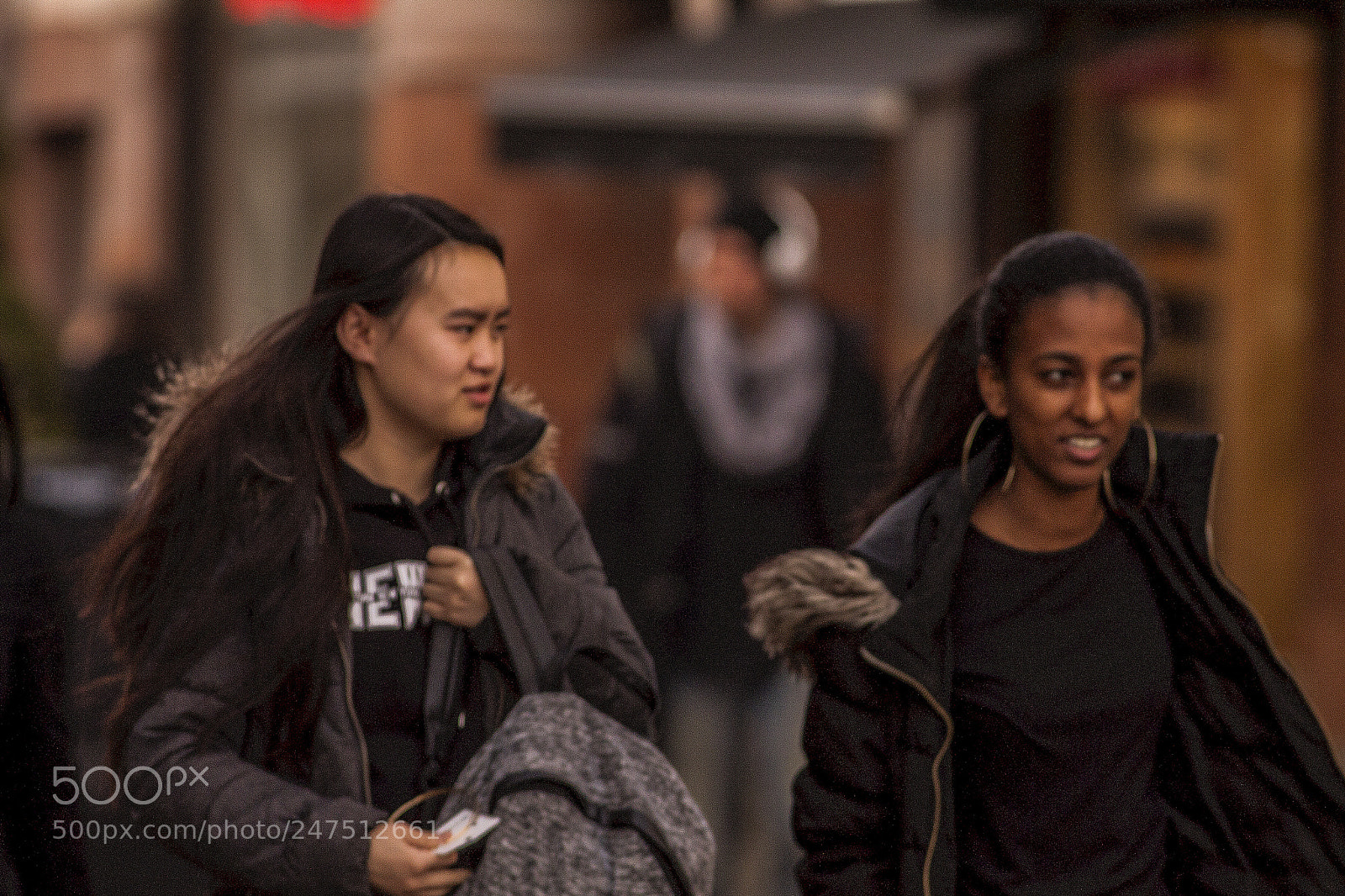 Canon EOS 50D sample photo. Two pedestrians walking down photography