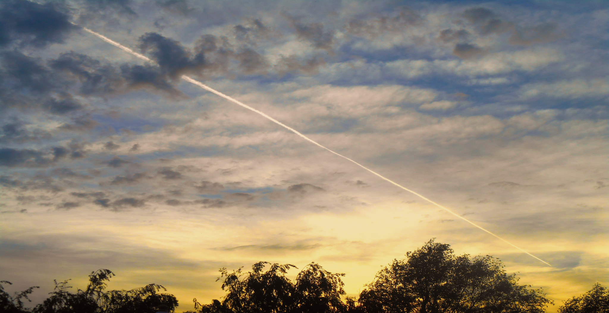 Nikon COOLPIX S3400 sample photo. Contrail cloudscape photography