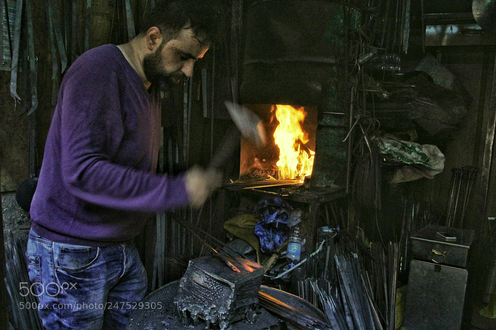 Canon EOS 60D sample photo. Blacksmith is working hard photography